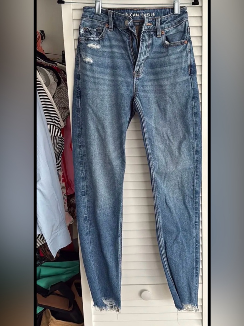 American Eagle Outfitters Light Blue Skinny Jeans with Distressed Hem